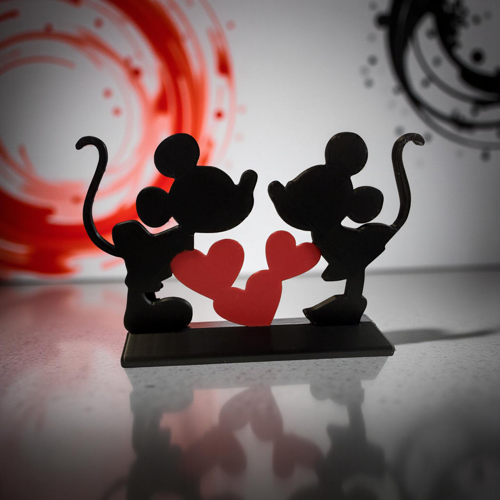 Två silhuetter. Tre hjärtan. Oändlig kärlek.